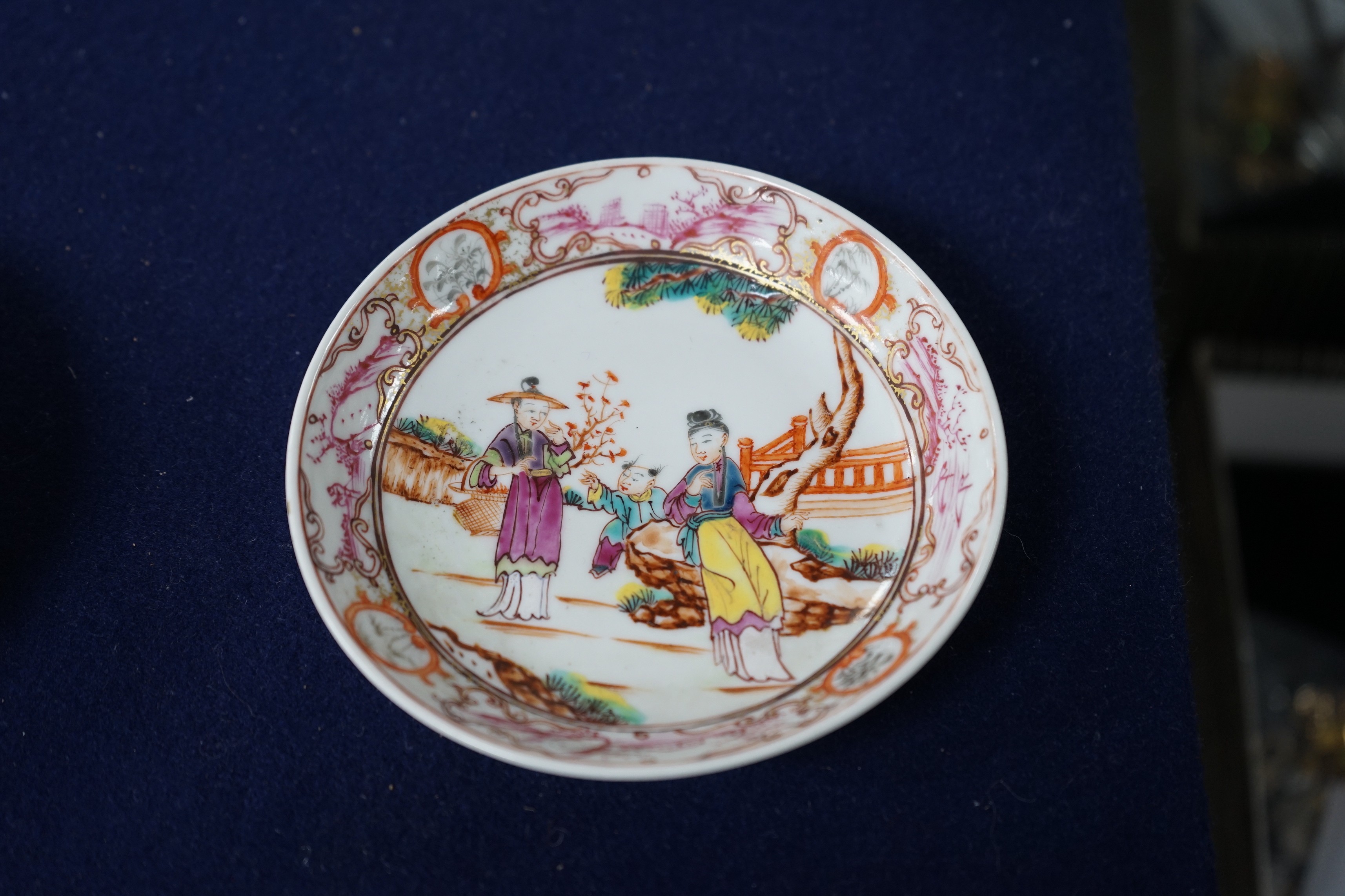 A group of four 18th century Chinese export famille rose saucers